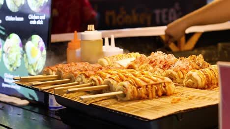 delicious street food being prepared and served