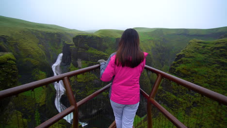 Woman-traveller-at-Fjadrargljufur-in-Iceland.