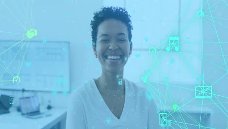 Animation-of-data-processing-over-african-american-businesswoman-smiling-in-office