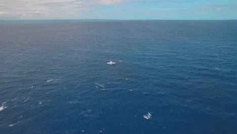 solitary boat in the middle of ocean