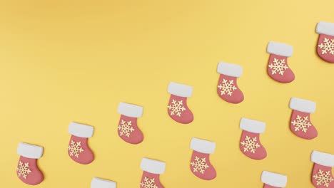 Festive-Stockings:-A-yellow-Christmas-Flatlay-background