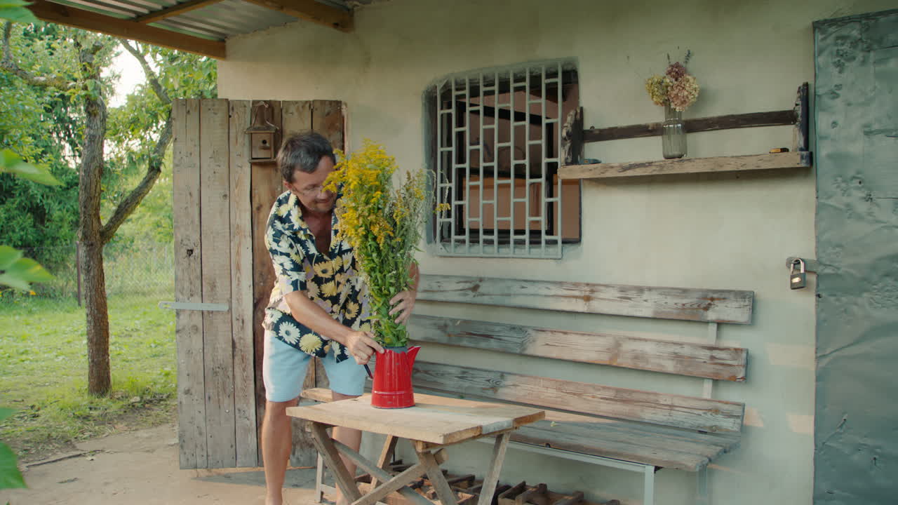 Man relaxing with flowers in a rustic garden setting