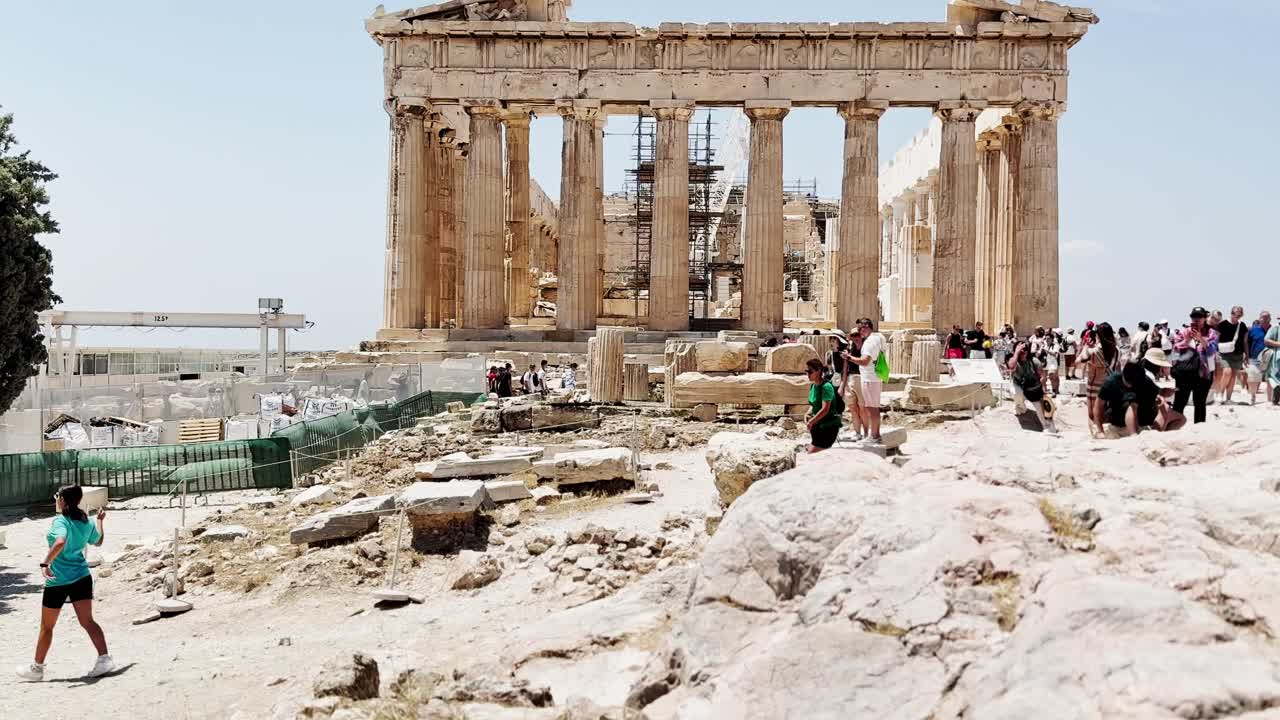 The Parthenon Temple with Tourists at the Acropolis, Athens, Greece