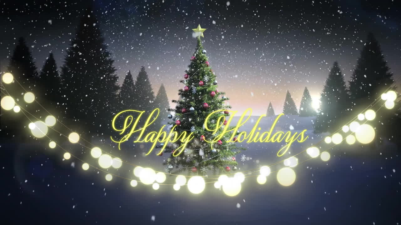 In snowy forest, Christmas tree with lights displaying Happy Holidays animation
