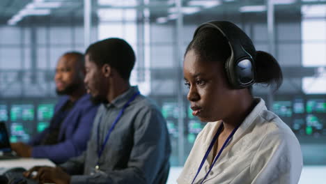 diverse team in a control room