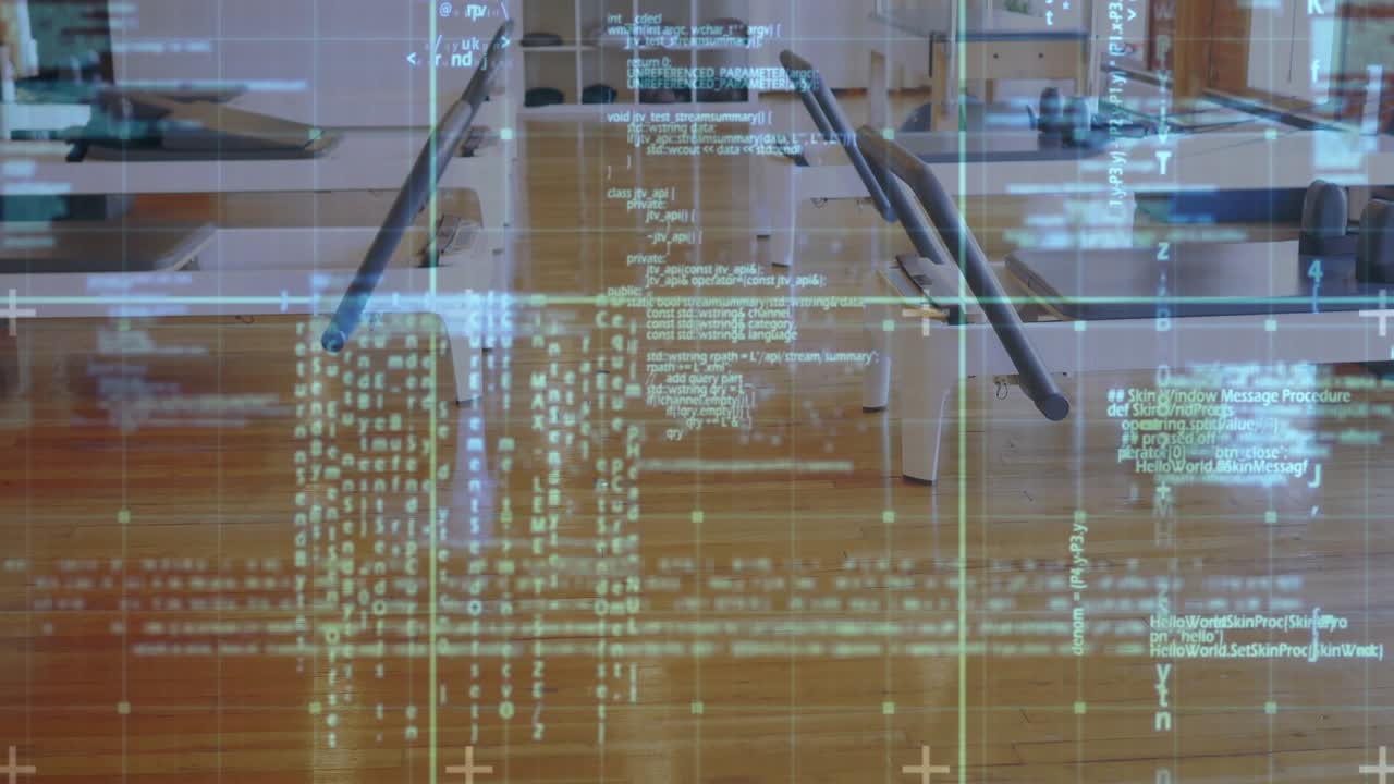 Central monitor arms and aisle receiving green code overlay on first frame scrolling to show data