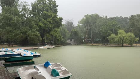 raining in the european park of cismigiu in bucharest, romania