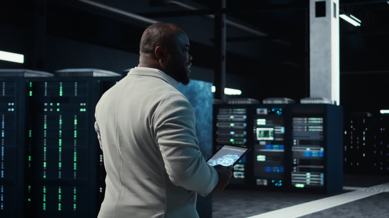 Vertical video Software developer in data center using tablet, employing machine learning