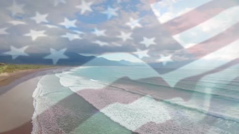 Animation-of-flag-of-america-waving-and-person-making-thumbs-up-gesture,-over-sunny-beach