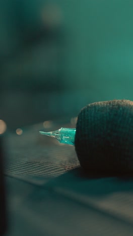 close-up of a tattoo machine needle