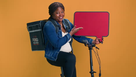 Delivery-Woman-With-Red-Sign-In-Hand