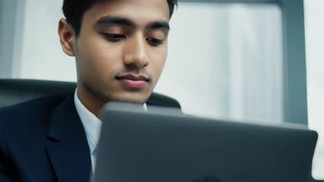 businessman working on laptop in office