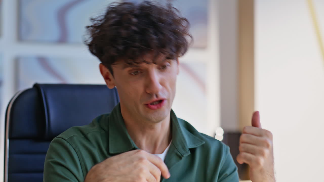 Entrepreneur explaining tasks virtual conference at company workplace closeup