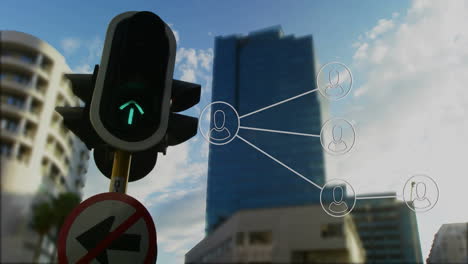 in city, animation showing green arrow traffic light over network connections