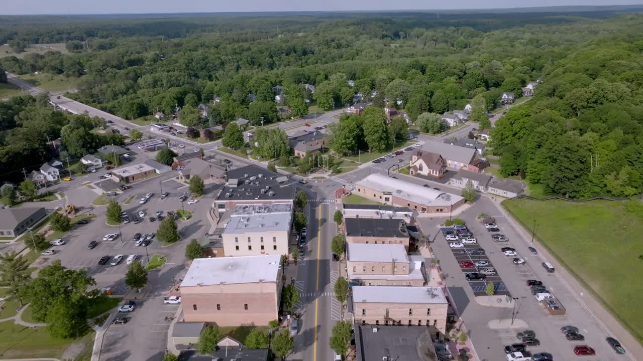 Newaygo, Michigan downtown with drone video moving in