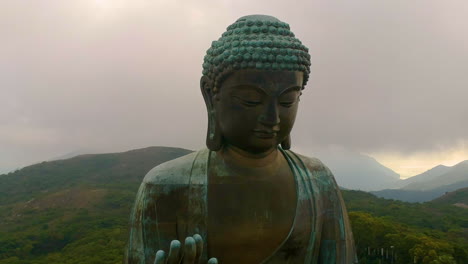 buddha tian tan sitting on a hilltop of ngong ping in lantau island, hong kong