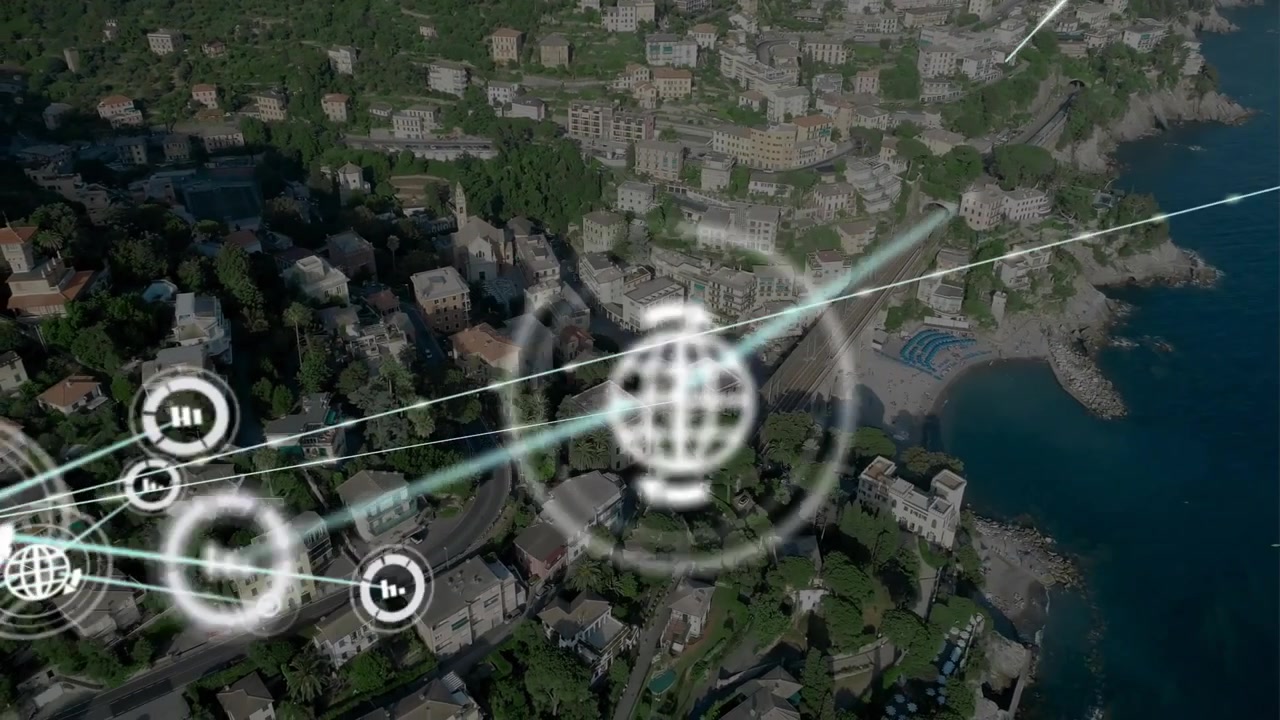Digital Network Overlaying an Aerial View of a Coastal City