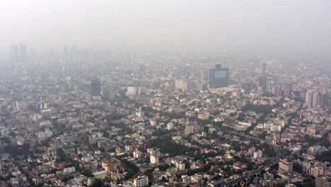 aerial wide shot of a very polluted mexico city