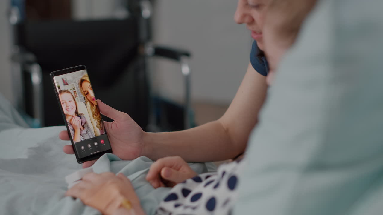 Mother with sick daughter having online videocall meeting conference