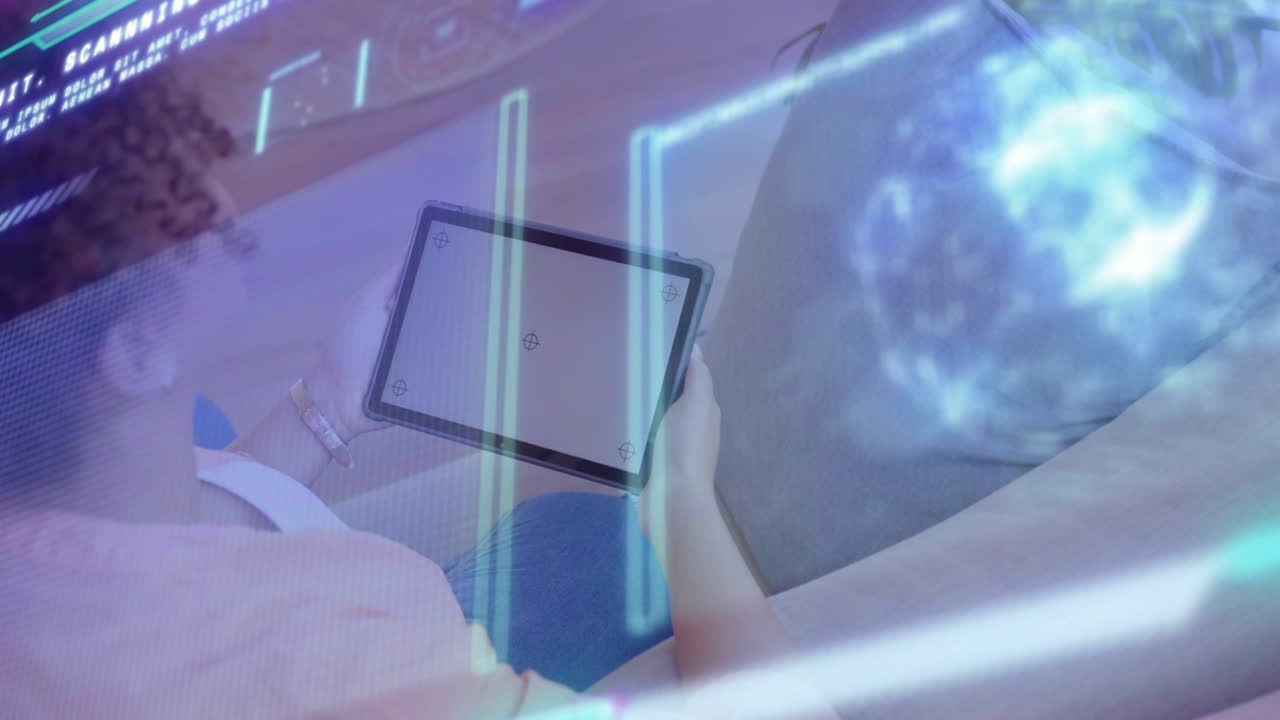 Adult woman sitting on sofa holding tablet, screen causing glowing bars and orb animating for tech