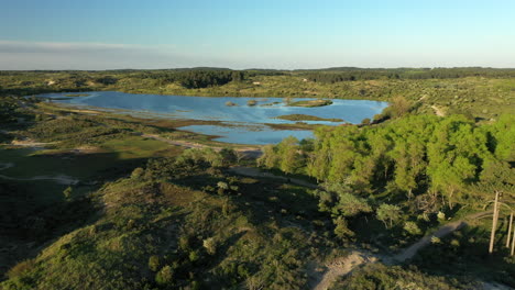 aerial of vogelmeer with sunset in national park kennemerland