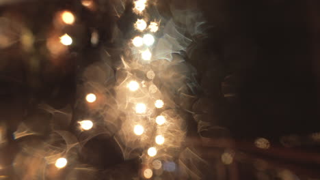 blurry twinkling christmas lights in rainy bokeh