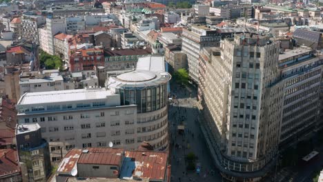 aerial: belgrade city centre, serbian capital buildings and streets on sunny day