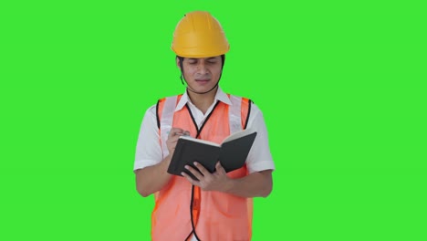 Confused-Indian-architect-writing-notes-about-building-Green-screen