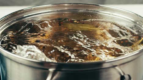 boiling spices in water for soup or stew