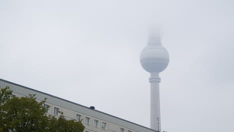 berlin fernsehturm timelapse during misty day in capital of germany