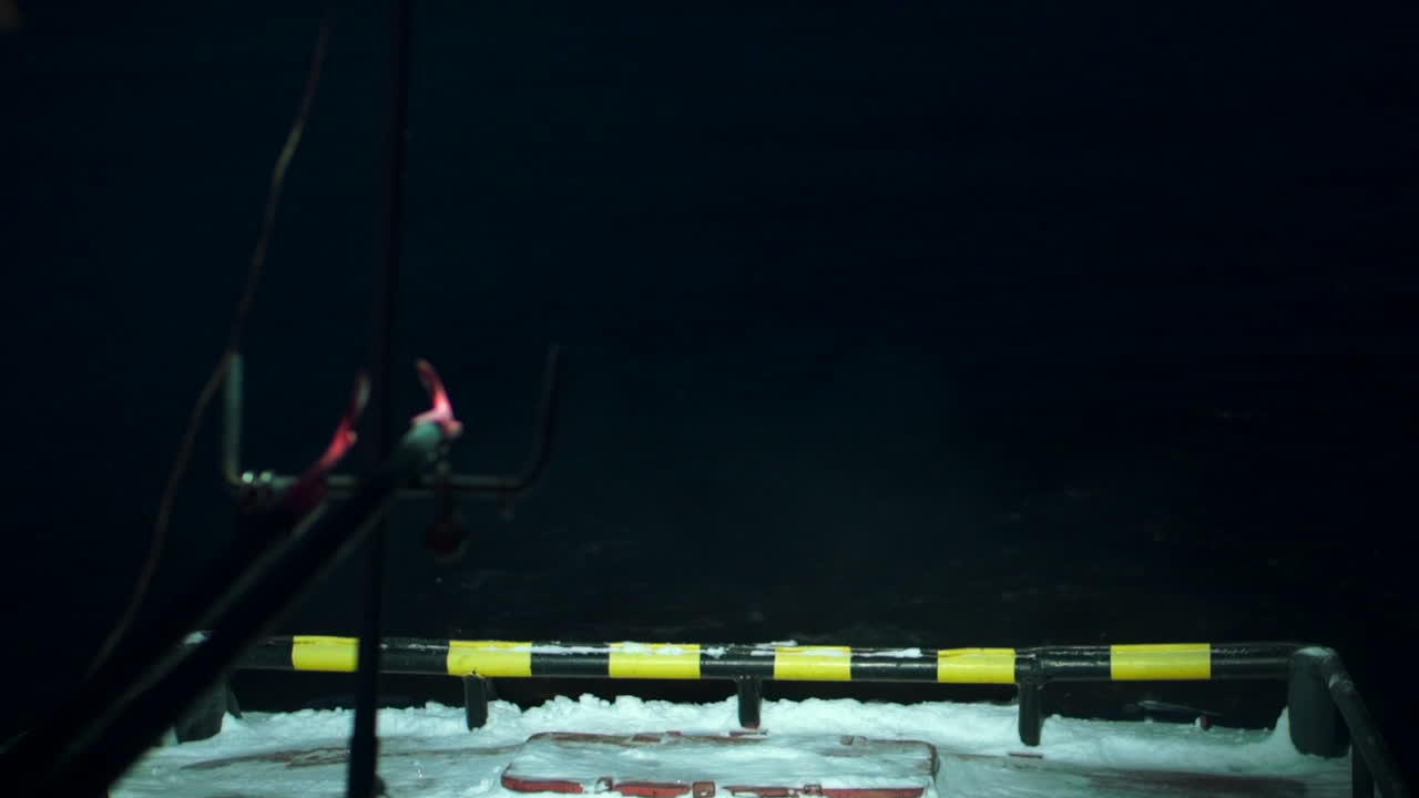 Nighttime View from a Vessel on Frozen Water