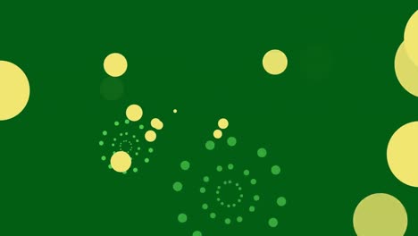 Animation-of-green-firework-explosions-and-bokeh-yellow-light-spots-on-green-background