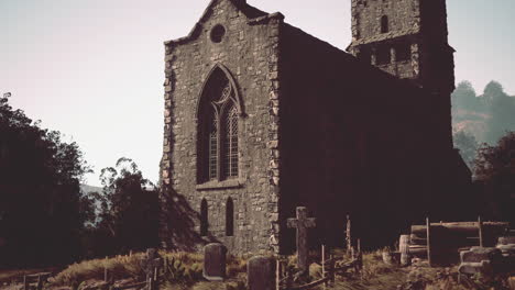 abandoned medieval church in a graveyard setting