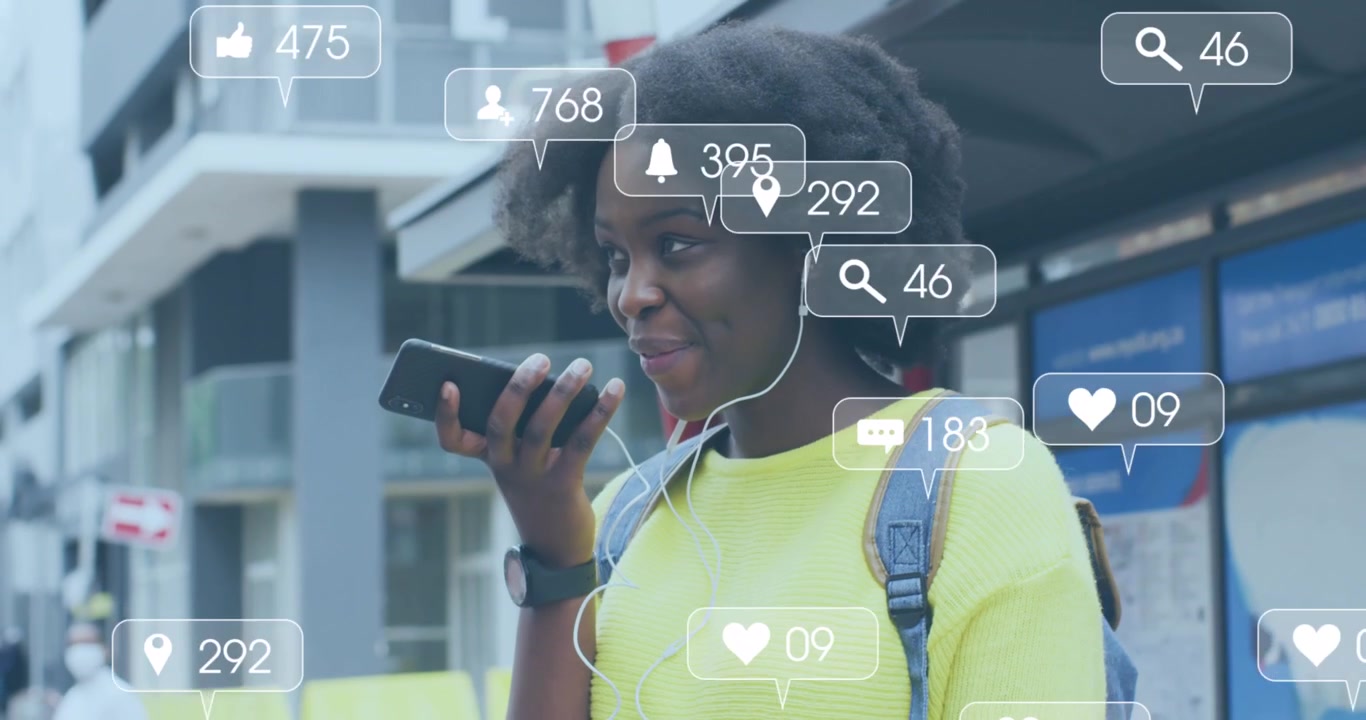 Animation of social media icons over african american woman using smartphone