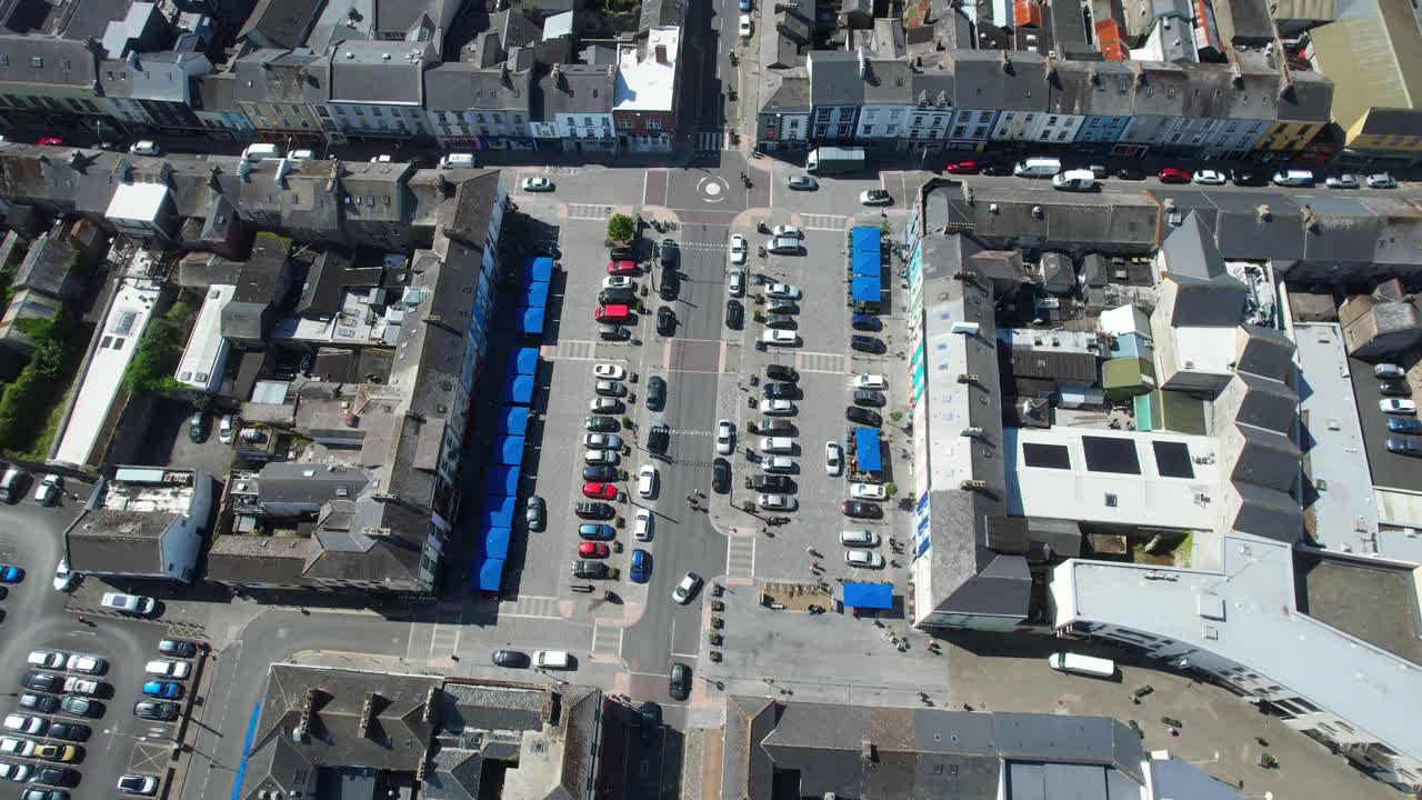 Drone overview of The Square Dungarvan Waterford parked cars and busy town centre Ireland Epic Locations