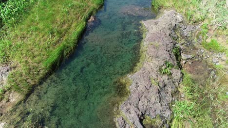 Aerial-footage-flying-over-a-creek-in-Texas