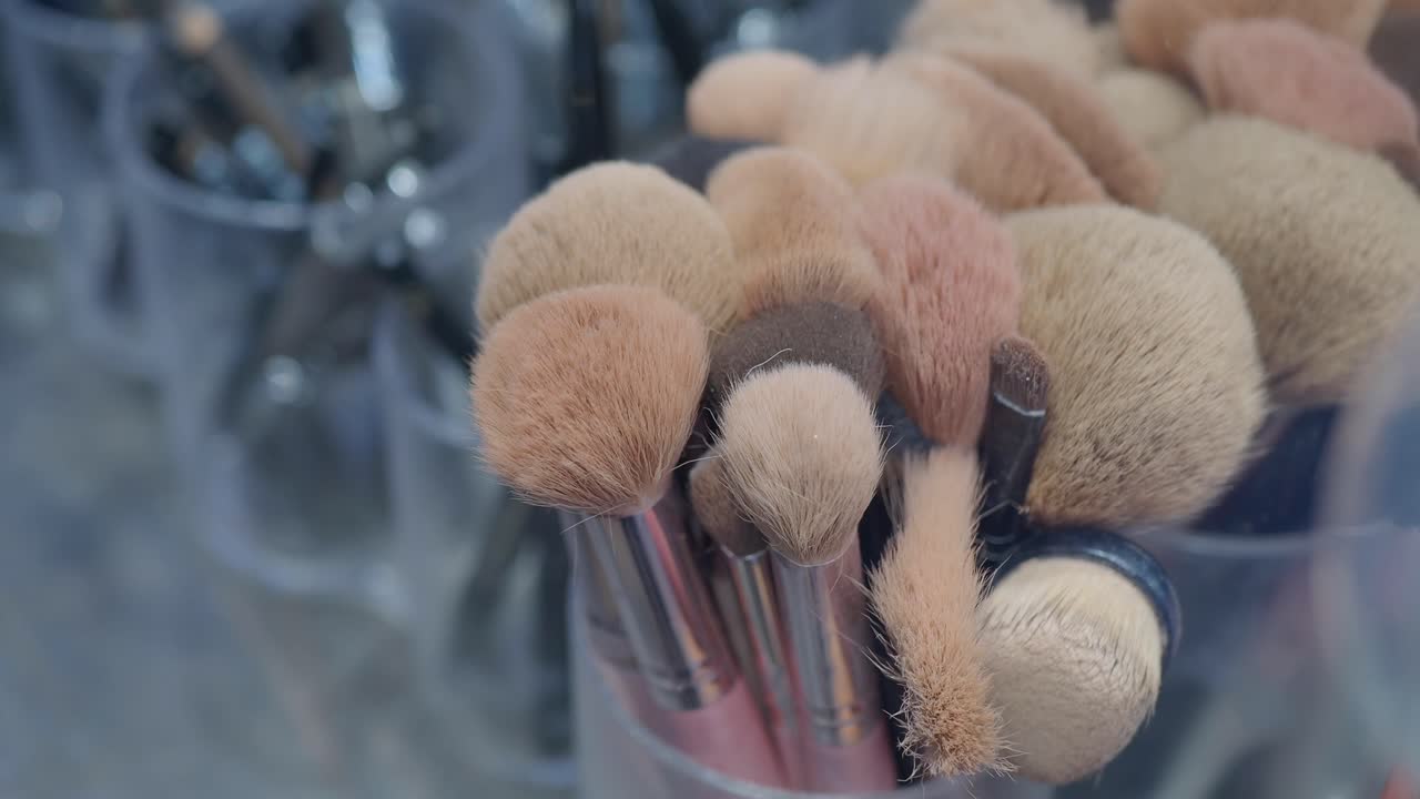 Close up of makeup brushes in a holder