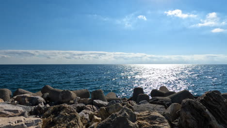 4k shot of beautiful horizon over water by the famous puerto banus bay in marbella, spain