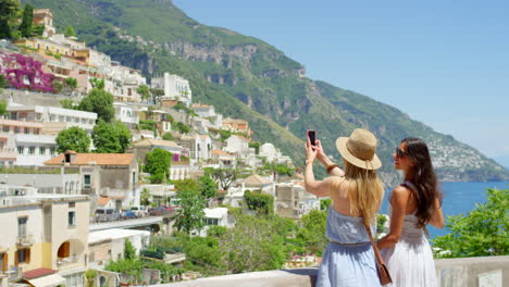 two friends recording a video using a smartphone