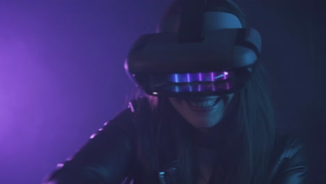 anonymous woman in vr goggles in neon light