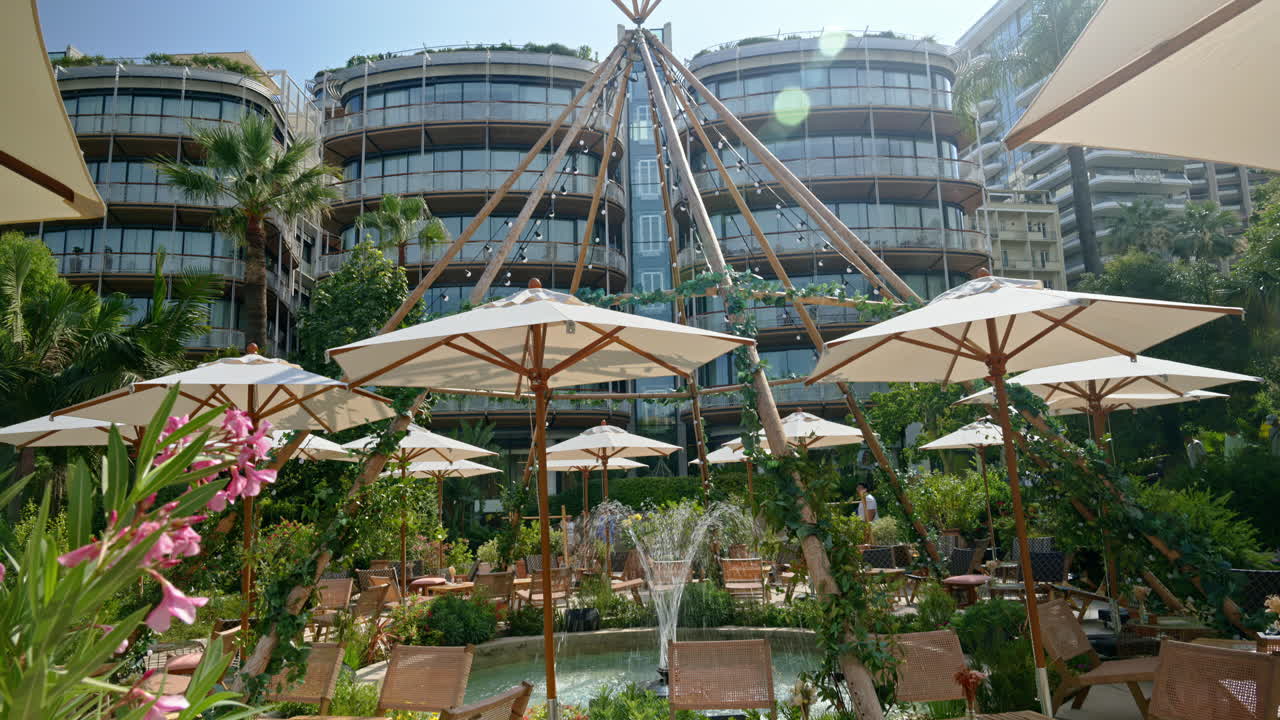 White umbrellas at a terrace in Monte Carlo, Monaco