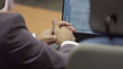 businessman reviewing a spreadsheet in a meeting