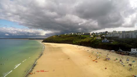 Aerial-View-Of-Beach-And-Seaside,-Coastline-of-Carbis-Bay,-St-Ives,-Cornwall,-Penzance