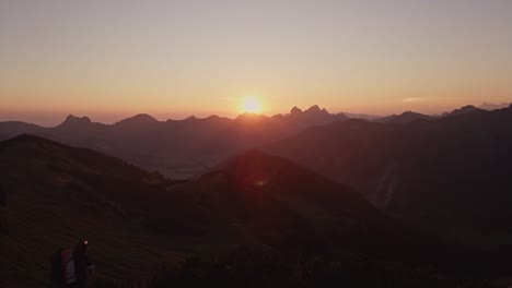 enjoy breathtaking drone footage of a sunrise in mannheimer tal, austria, featuring stunning alpine landscapes and a peaceful hiking experience in the early morning light.