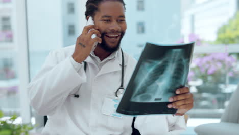 Male-doctor,-x-ray-and-phone-call-for-consulting