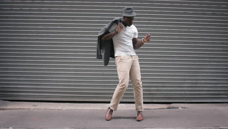 dance loop african american man dancing in street having fun celebrating with funny dance 4k