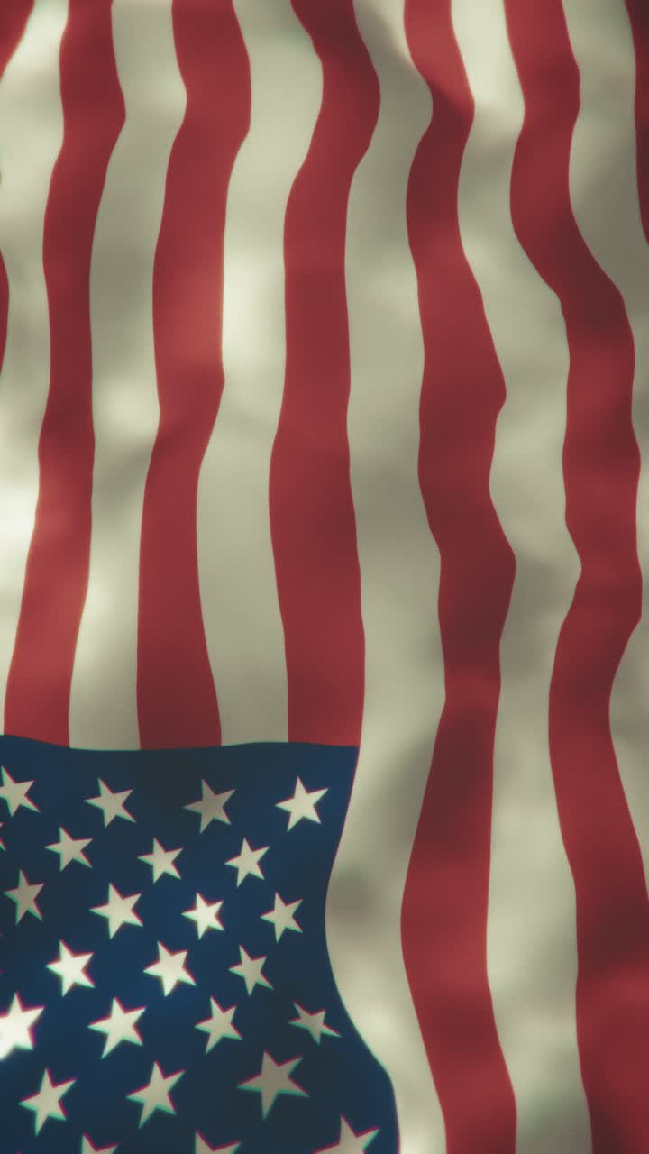 Seamless looping animation of a USA flag waving vigorously in the wind, perfect for patriotic, national, or celebratory themes. The flag moves dynamically with graceful, continuous motion