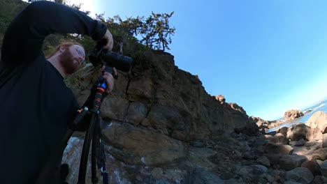 a photographer working on the oregon coast