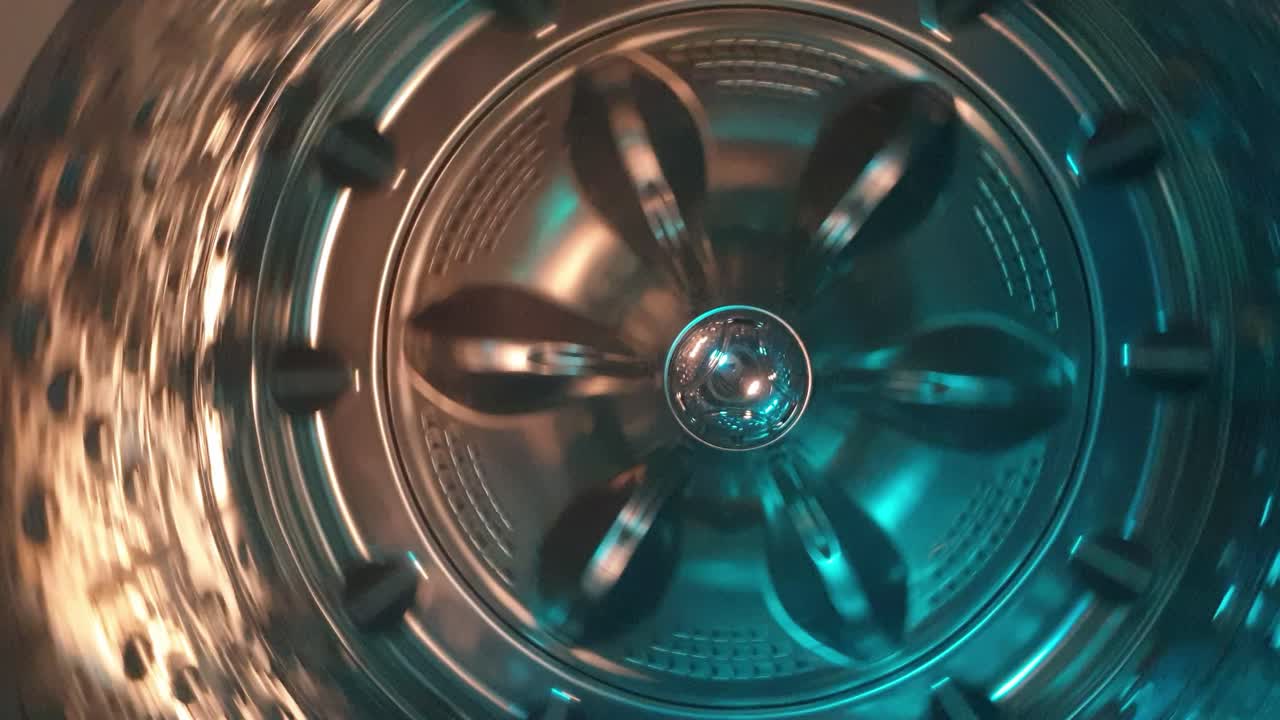 tambor de lavadora de acero inoxidable ciclo de giro, aspecto industrial futurista de maquinaria moderna