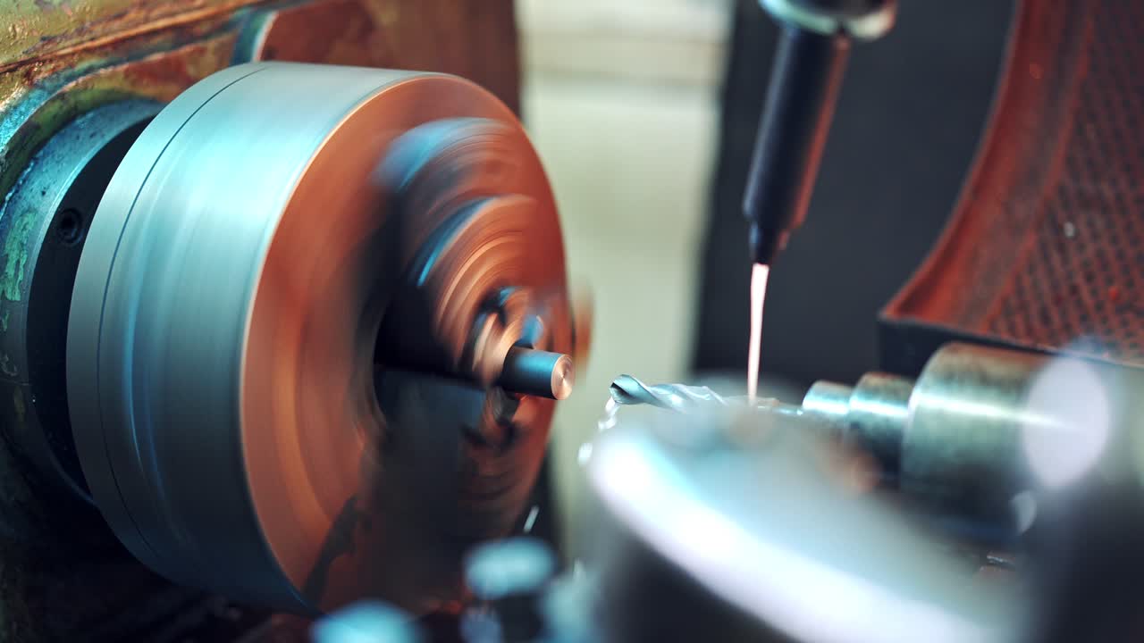 Metalworking CNC milling machine. Cutting metal modern processing technology. Metal working machine with cutter tool during turbine aluminium detail milling at factory.